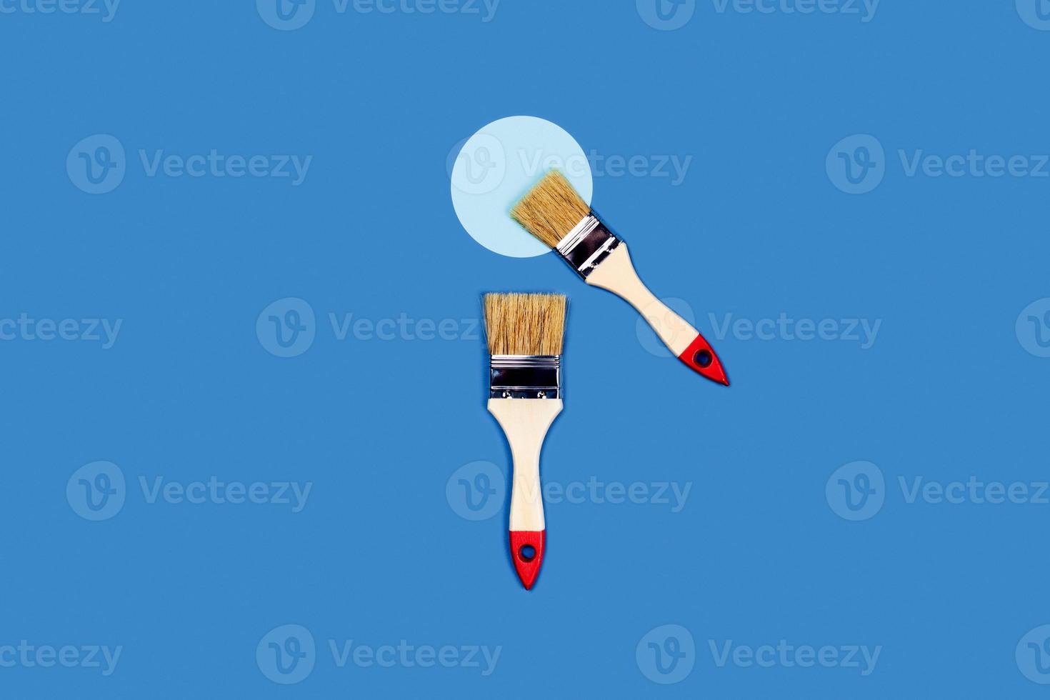 Brushes on a blue background. photo