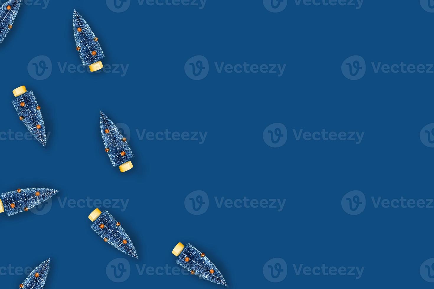 Blue background with christmas trees. photo