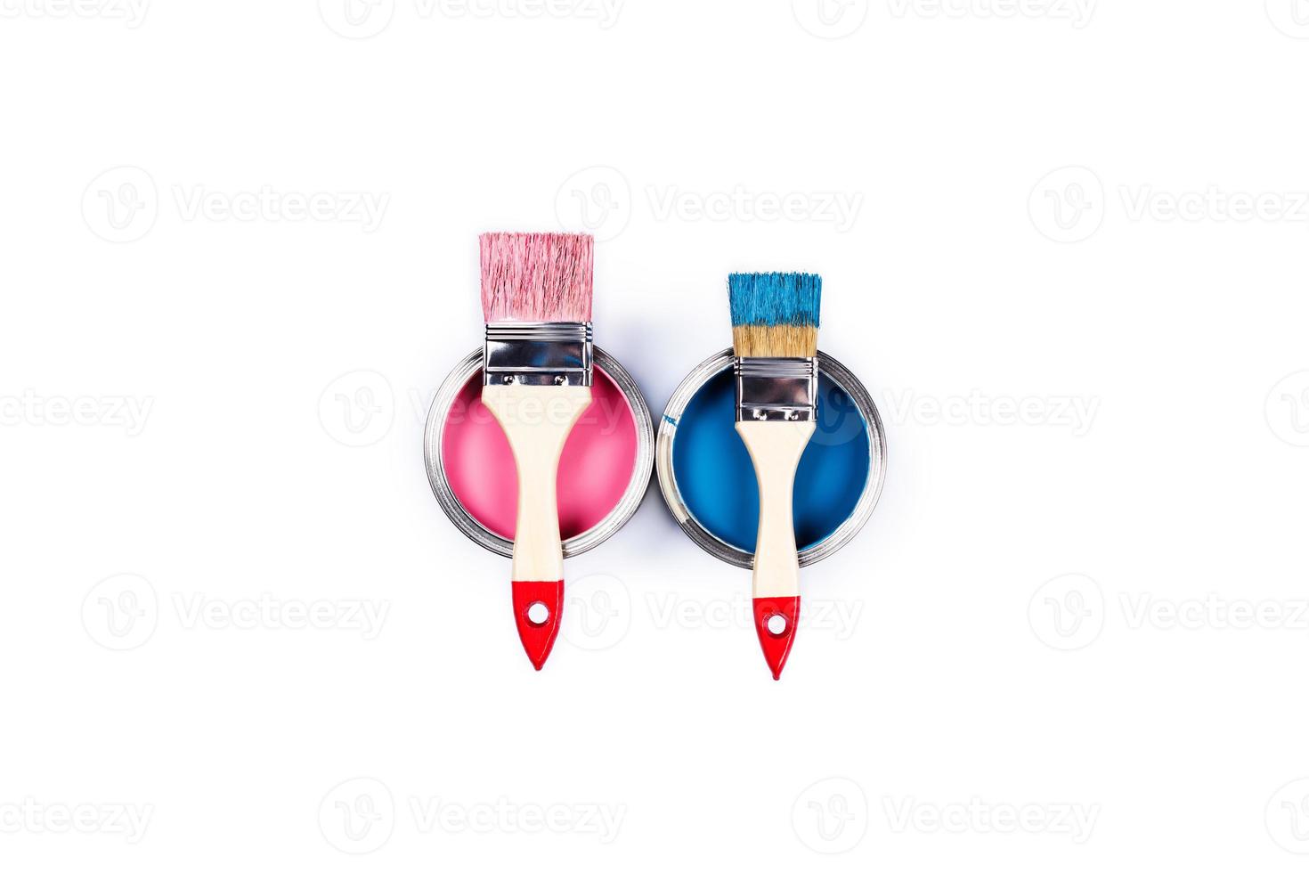 White background with two paint jars and brushes. photo