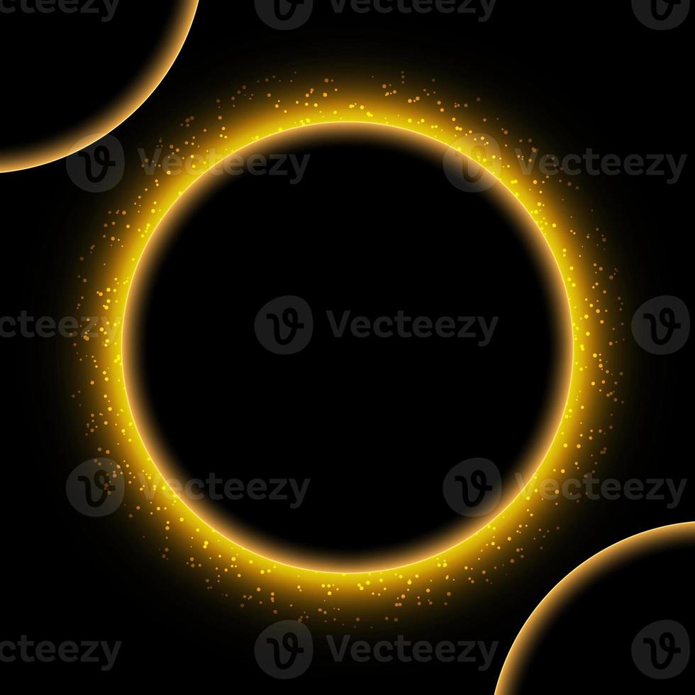 Glowing golden circle frame with glittering dust. Gold light circle with sparkles on black background. Yellow shiny ring, round frame for text, flare trail with glitter dust photo