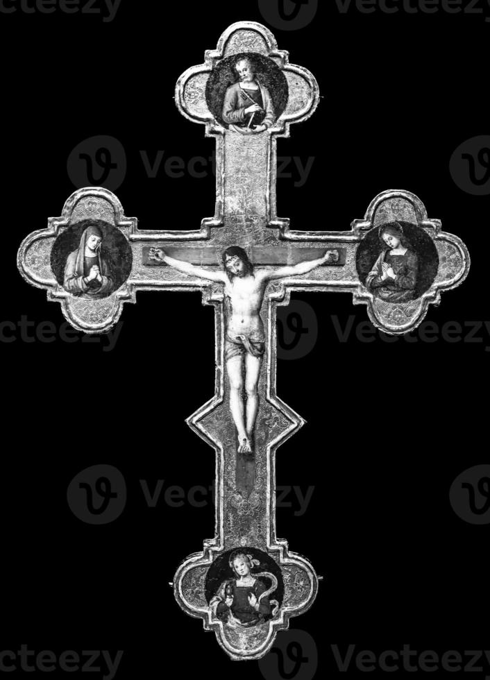 Antique crucifix made of gold - Roman Catholic Church, Jesus Christ. photo