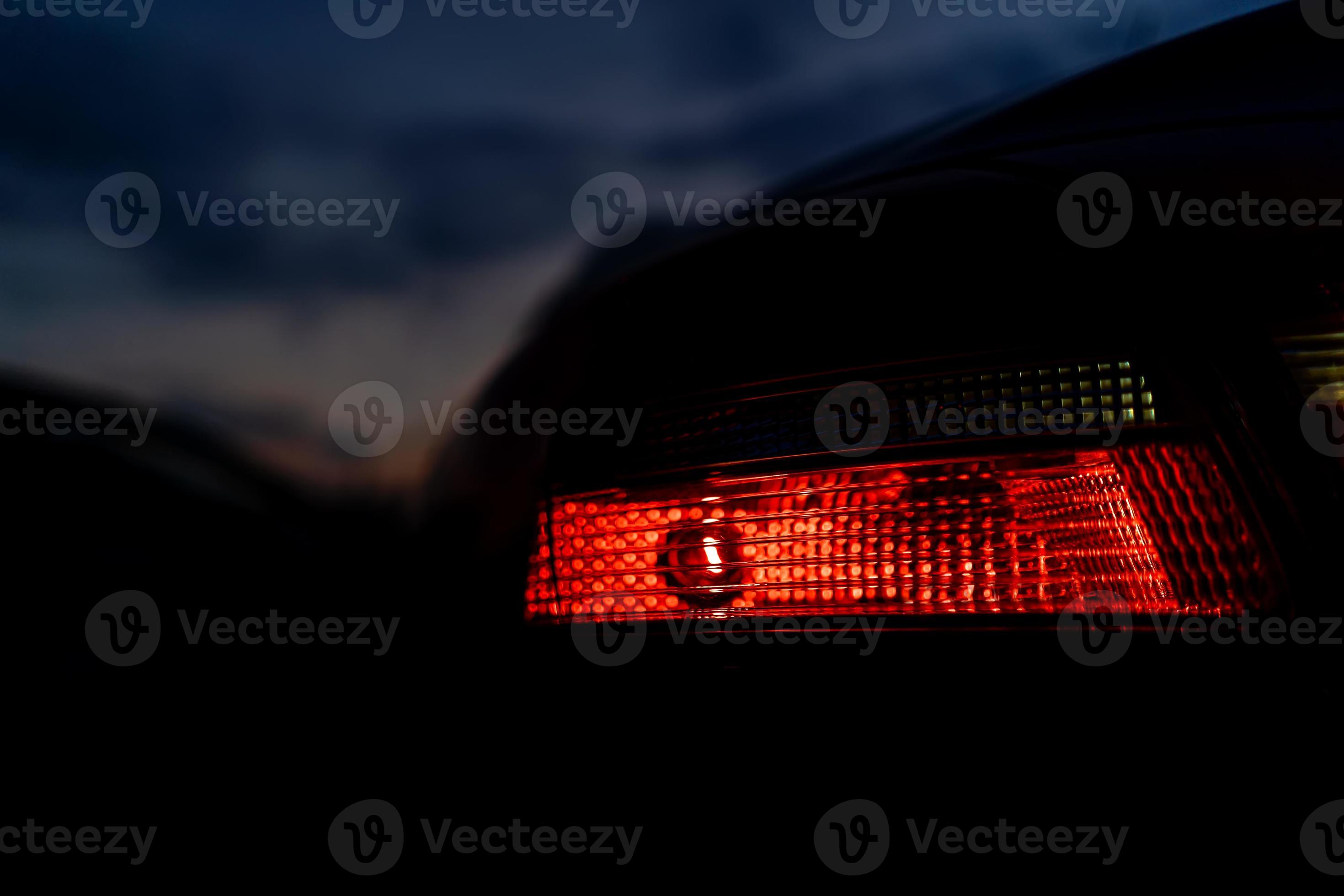 car tail light at night close up 15589686 Stock Photo at Vecteezy