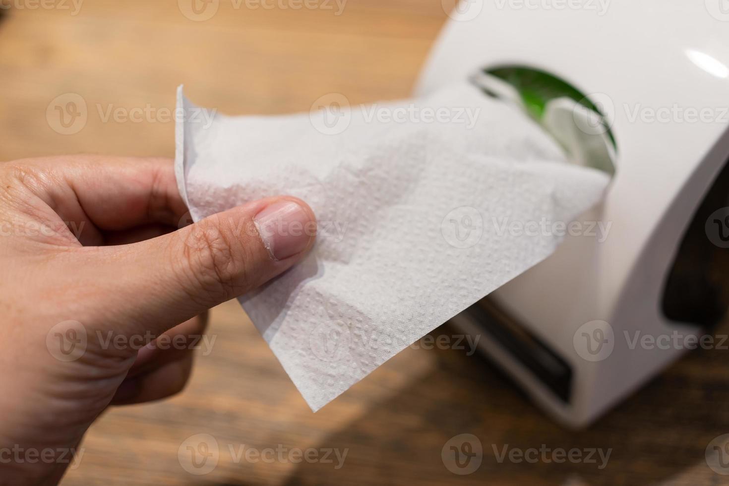 Tissue box with in food court. Tissue box on table in restaurant. paper napkin after eat food. photo