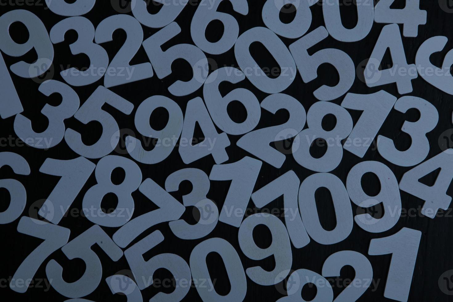 Background of numbers. from zero to nine. Numbers texture. Finance data concept. Mathematic. Seamless pattern with numbers. financial crisis concept. Business success. photo