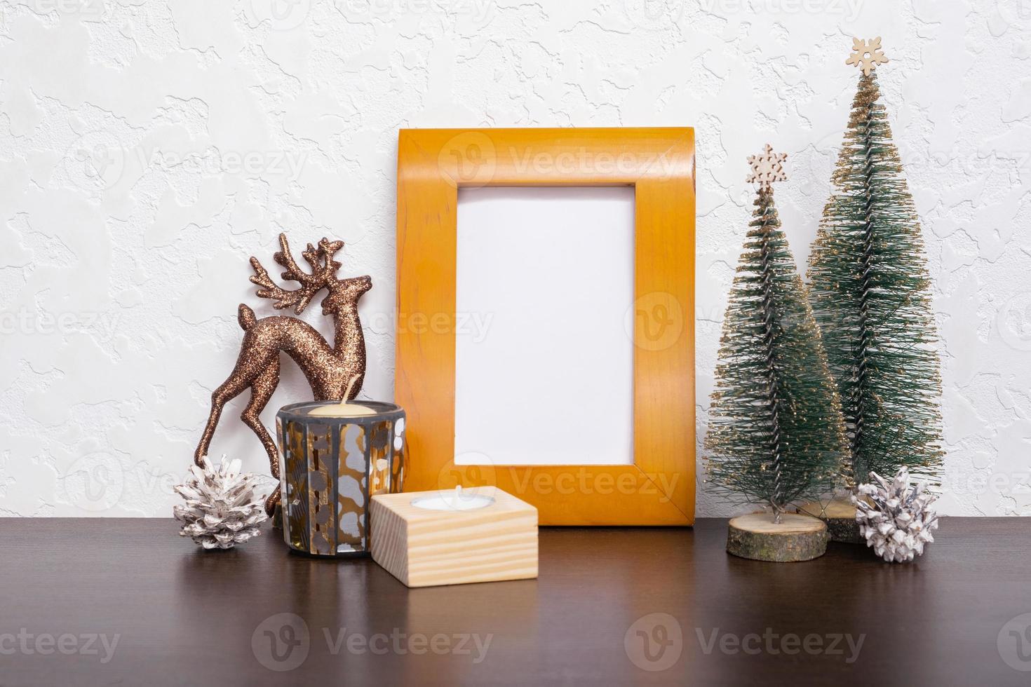 Mock up wooden frame with Christmas New Year decorations still life. Xmas text blank photo