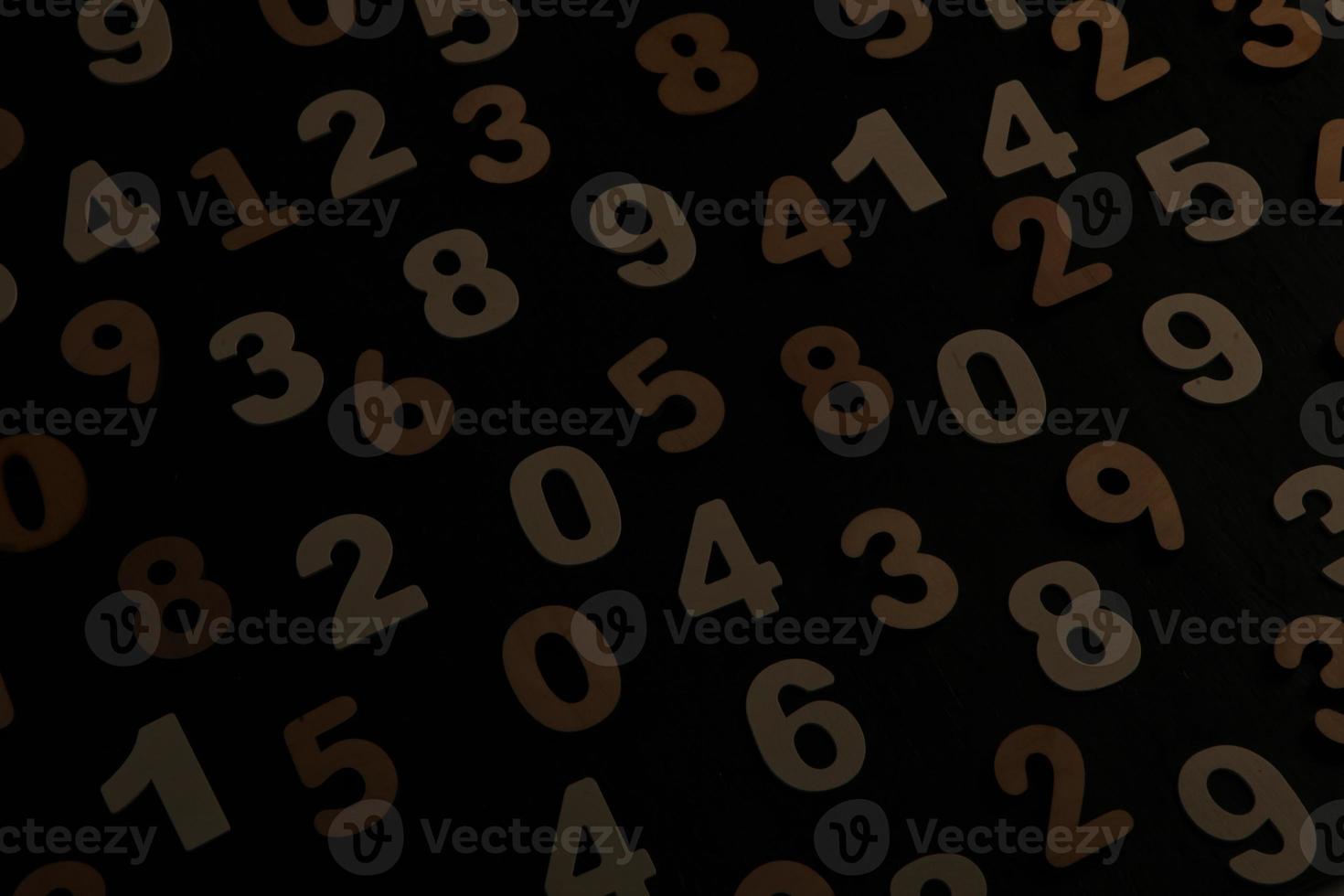 Colorful wooden numbers background. Numbers texture abstraction. Global economy crisis concept. Finance data pattern. photo
