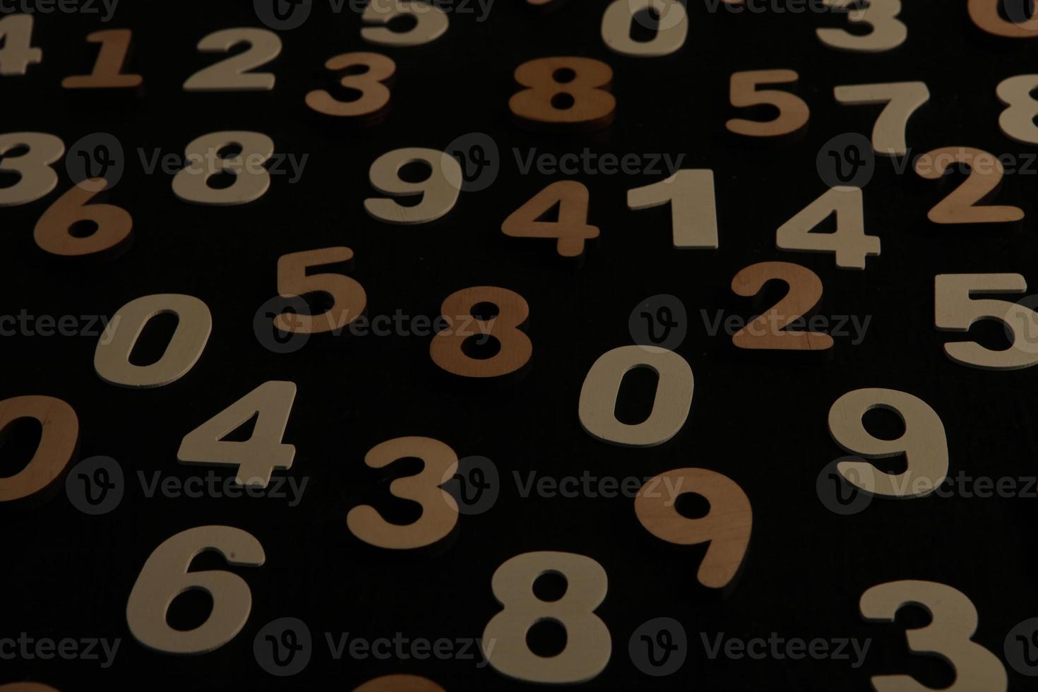 Colorful wooden numbers background. Numbers texture abstraction. Global economy crisis concept. Finance data pattern. photo