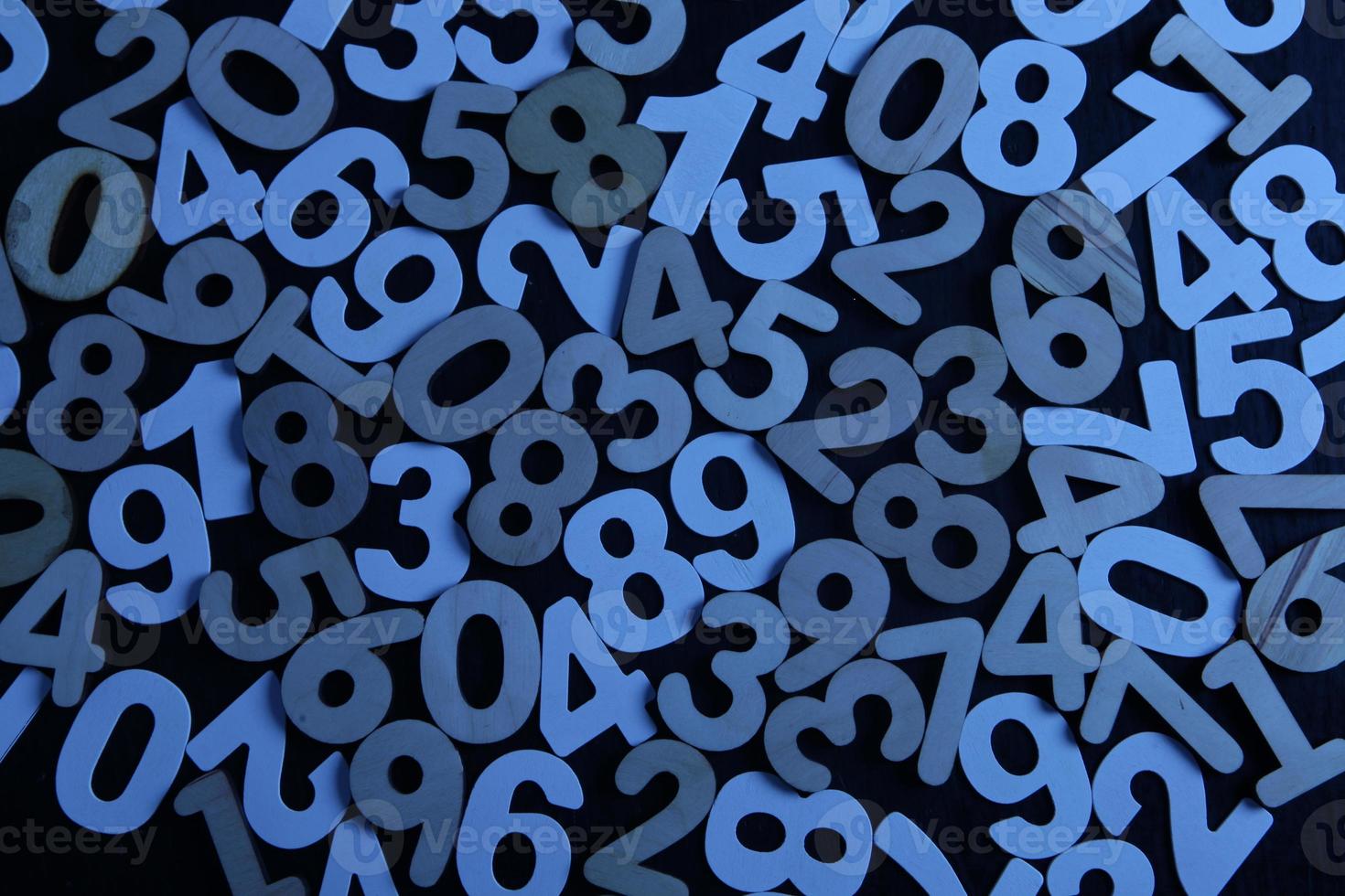 Background of numbers. from zero to nine. Numbers texture. Finance data concept. Mathematic. Seamless pattern with numbers. financial crisis concept. Business success. photo