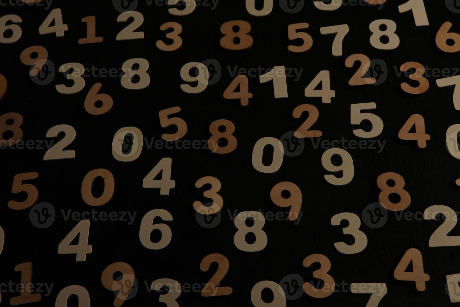 Colorful wooden numbers background. Numbers texture abstraction. Global economy crisis concept. Finance data pattern. photo