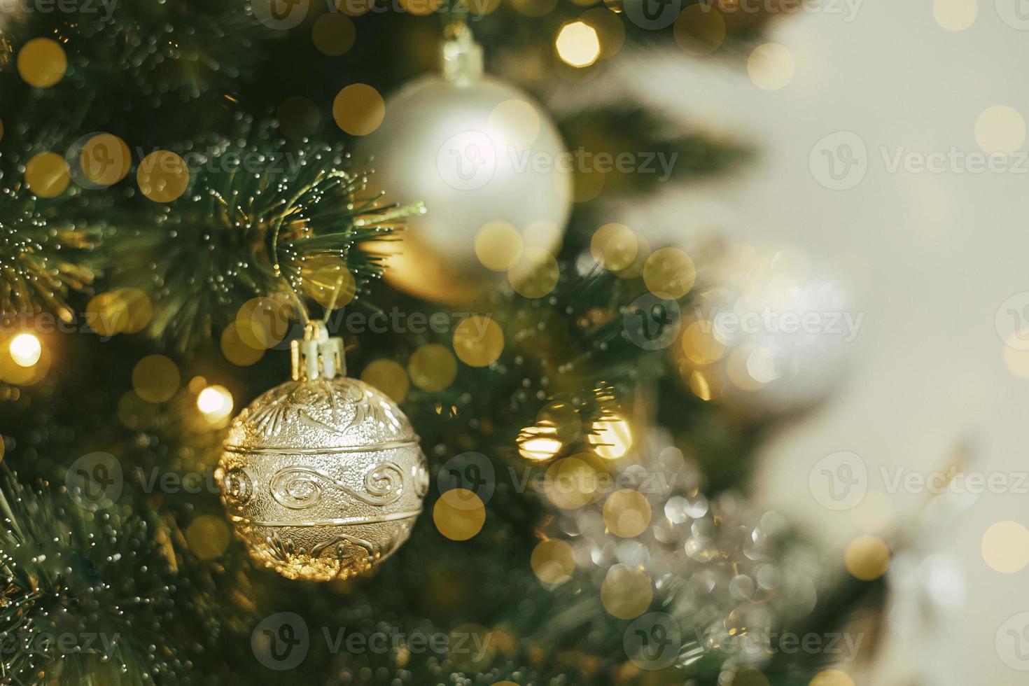 Decorated Christmas tree with silver and gray ornaments. Merry Christmas and happy new year concept photo