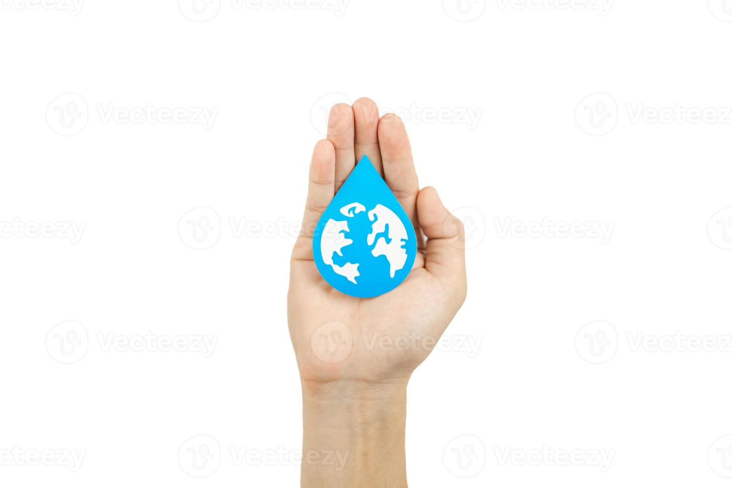Hands holding water drop paper cut, Washing hand, Hand sanitizer and Hygiene for covid pandemic. World water day, Save water, Renewable energy concept. photo