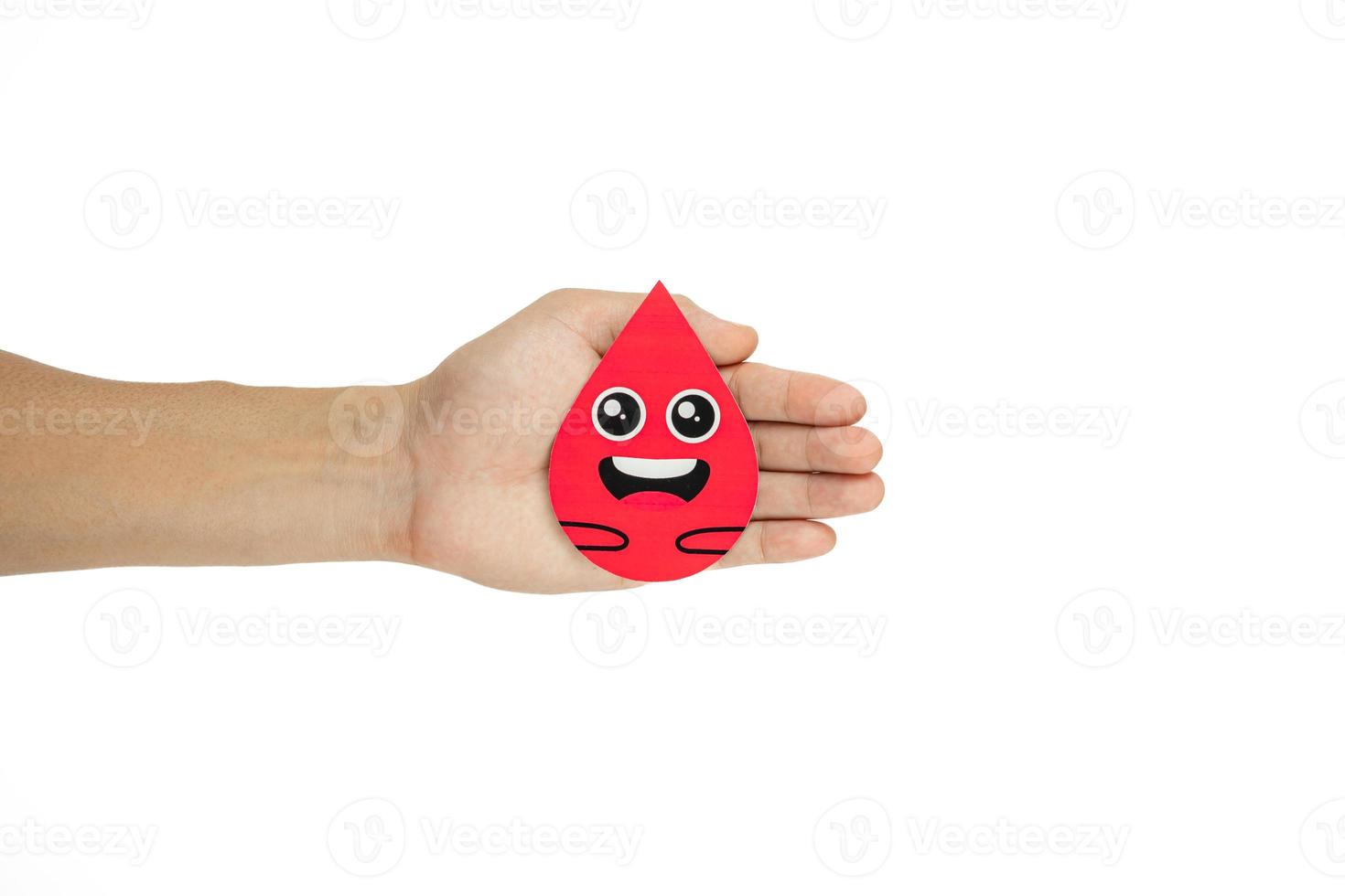 Hands holding blood drop paper cut on white background, Blood transfusion, World blood donor day. Blood Donation and Saving life Concept photo