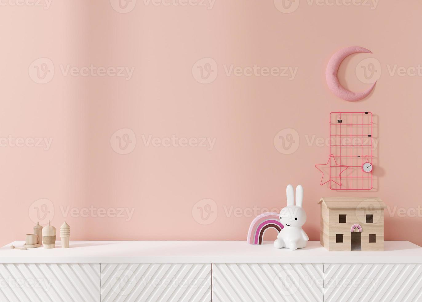 Empty pink wall. Mock up kids room interior in contemporary style. Close up view. Free, copy space for your picture or other small object. Sideboard, toys. 3D rendering. Child room mock-up. photo
