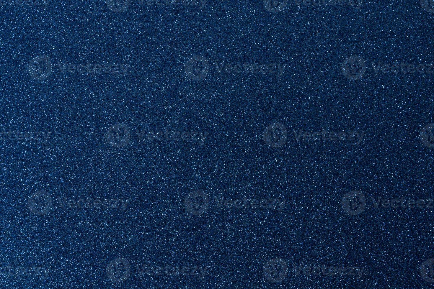 Dark blue, shiny and glittering surface. Abstract background. Events, celebrations. Trendy backdrop for your design. Texture with glitter. photo