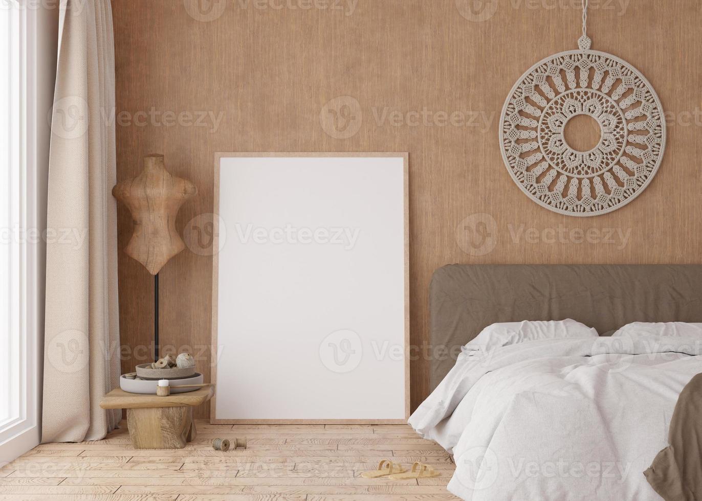 Empty vertical picture frame standing on parquet floor in modern bedroom. Mock up interior in boho style. Free space for picture or poster. Bed, macrame. 3D rendering. photo