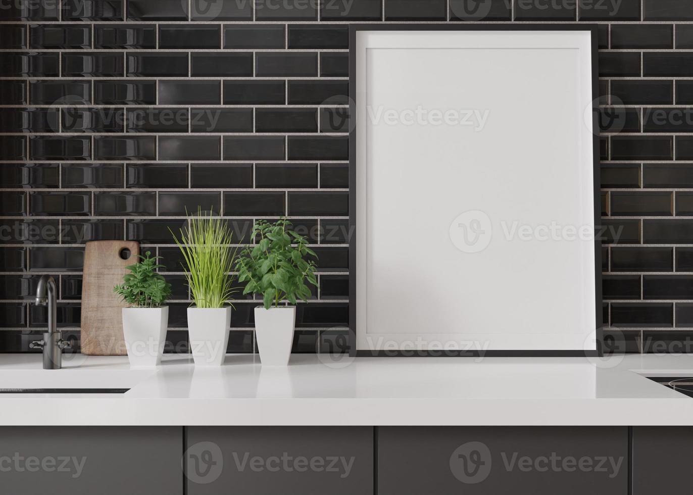 Empty vertical picture frame standing in modern kitchen. Mock up interior in minimalist, contemporary style. Free, copy space for your picture, poster. Close up view. 3D rendering. photo