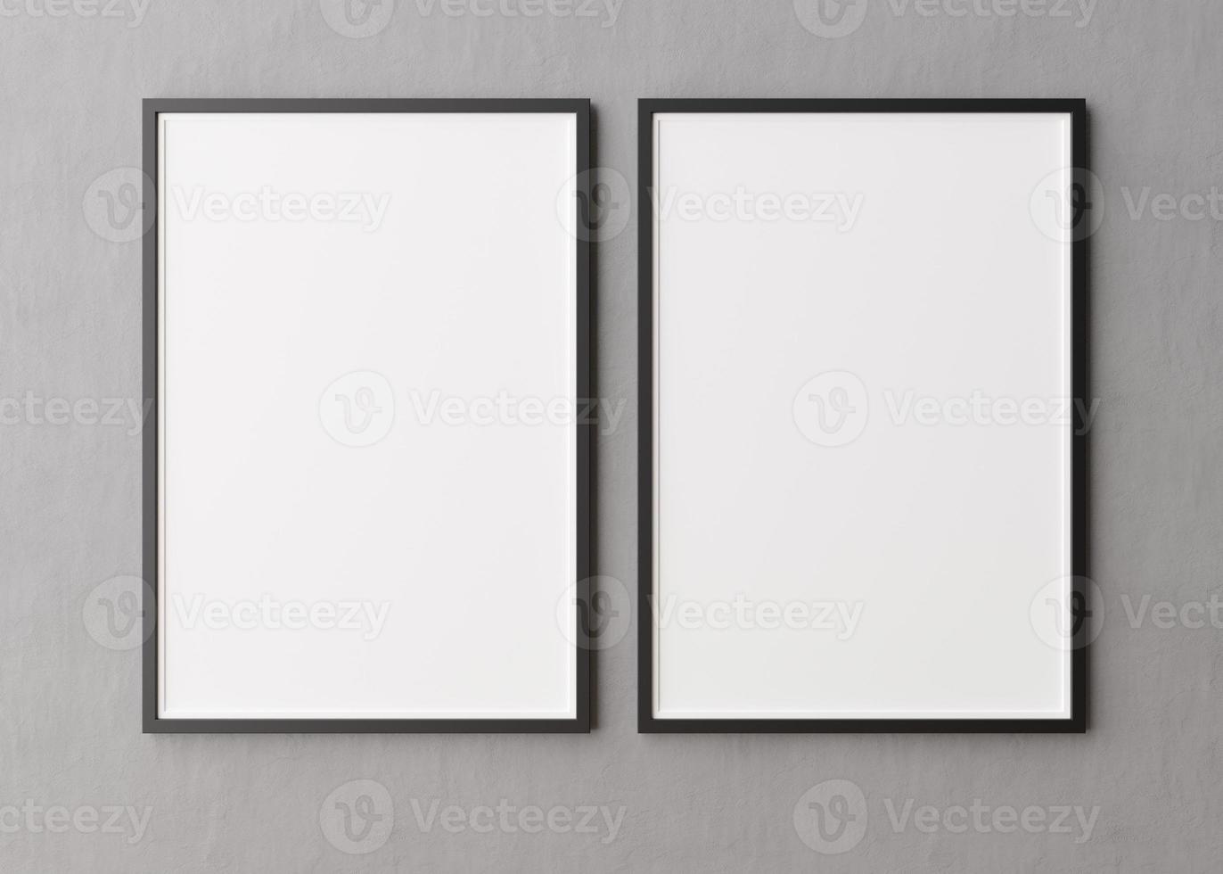 Two blank vertical picture frames hanging on concrete wall. Template, mock up for your picture or poster. Copy space. 3D rendering. photo