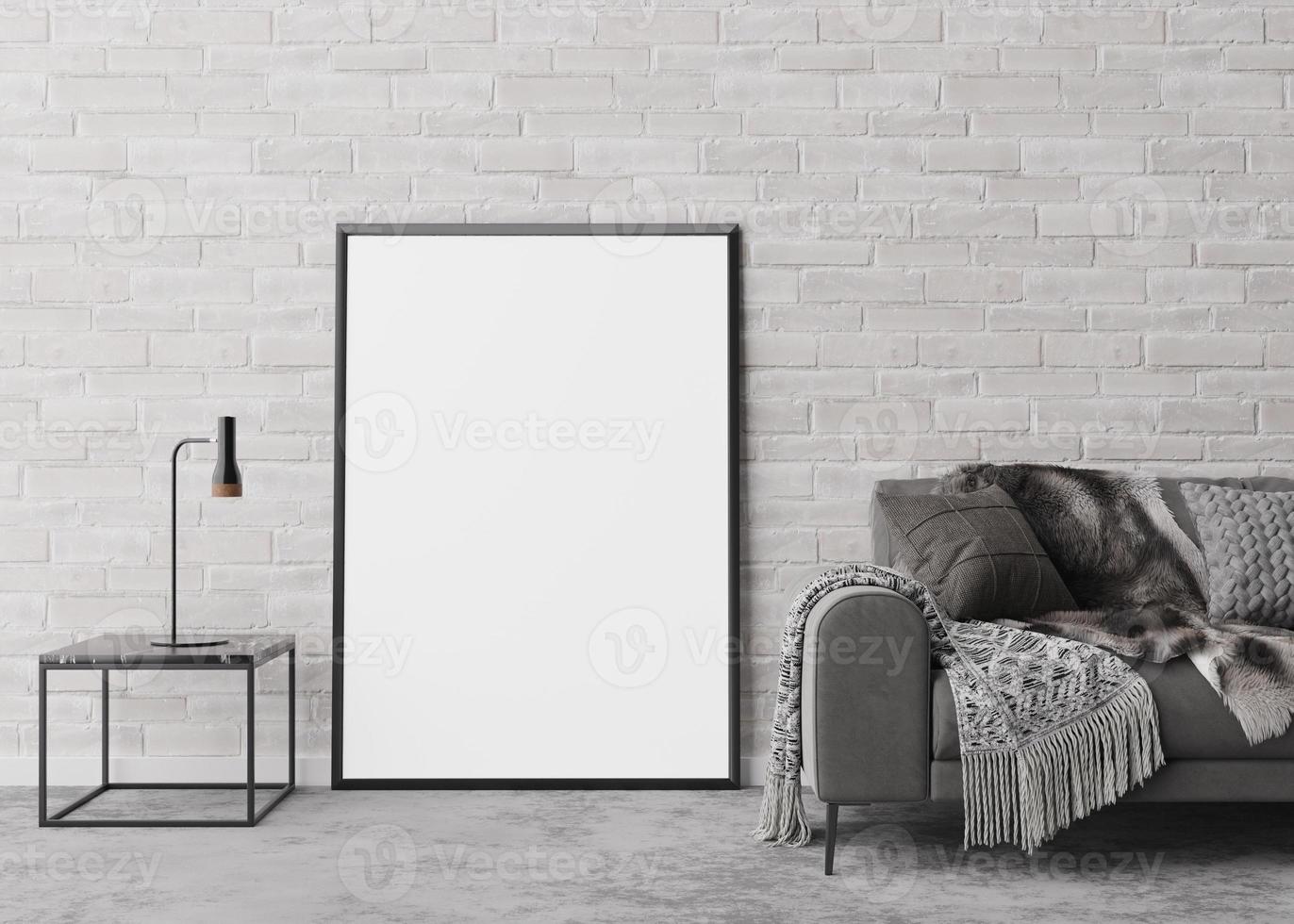 Empty vertical picture frame standing on the floor in modern living room. Mock up interior in contemporary style. Free space for picture, poster. Sofa, table, lamp. 3D rendering. photo