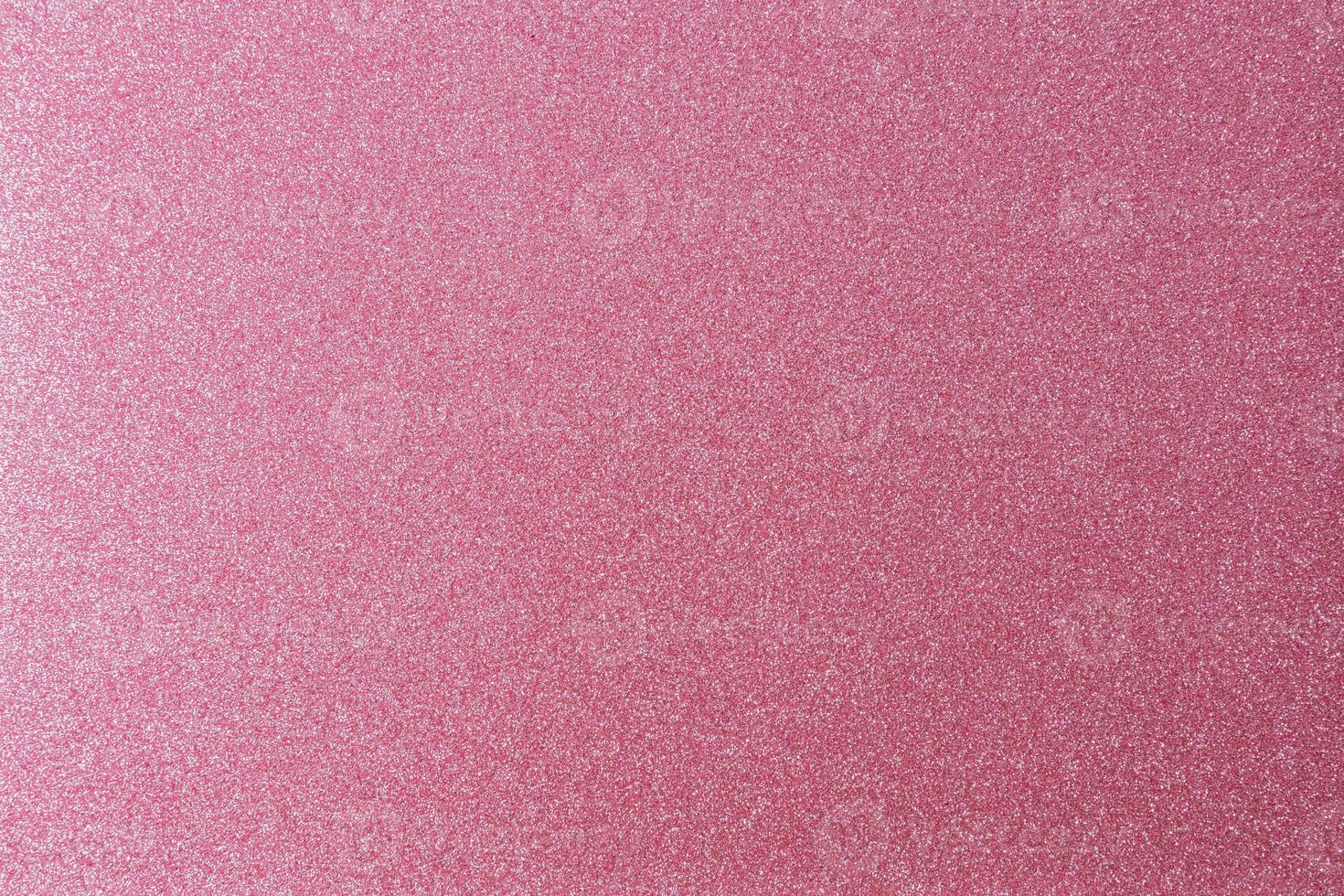 Pink shiny and glittering surface. Abstract background. Events, celebrations. Trendy backdrop for your design. Texture with glitter. photo