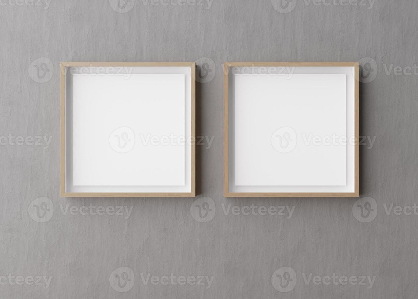 Two blank square picture frames hanging on gray concrete wall. Template, mock up for your picture or poster. Copy space. 3D rendering. photo
