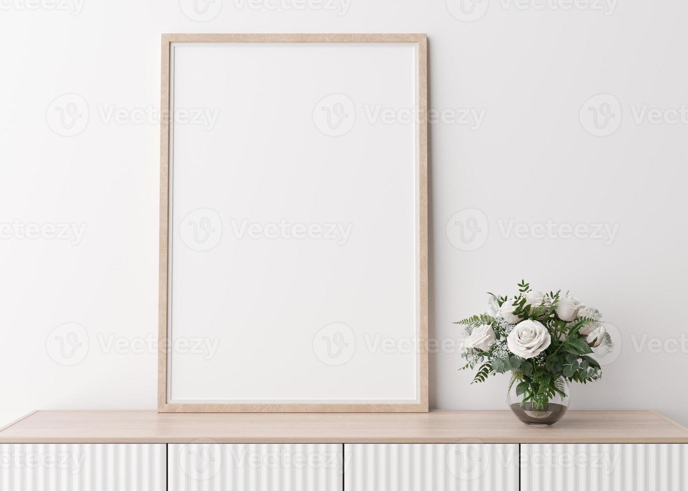 Empty vertical picture frame on white wall in modern living room. Mock up interior in minimalist, scandinavian style. Free space for picture. Console, flowers in vase. 3D rendering. photo