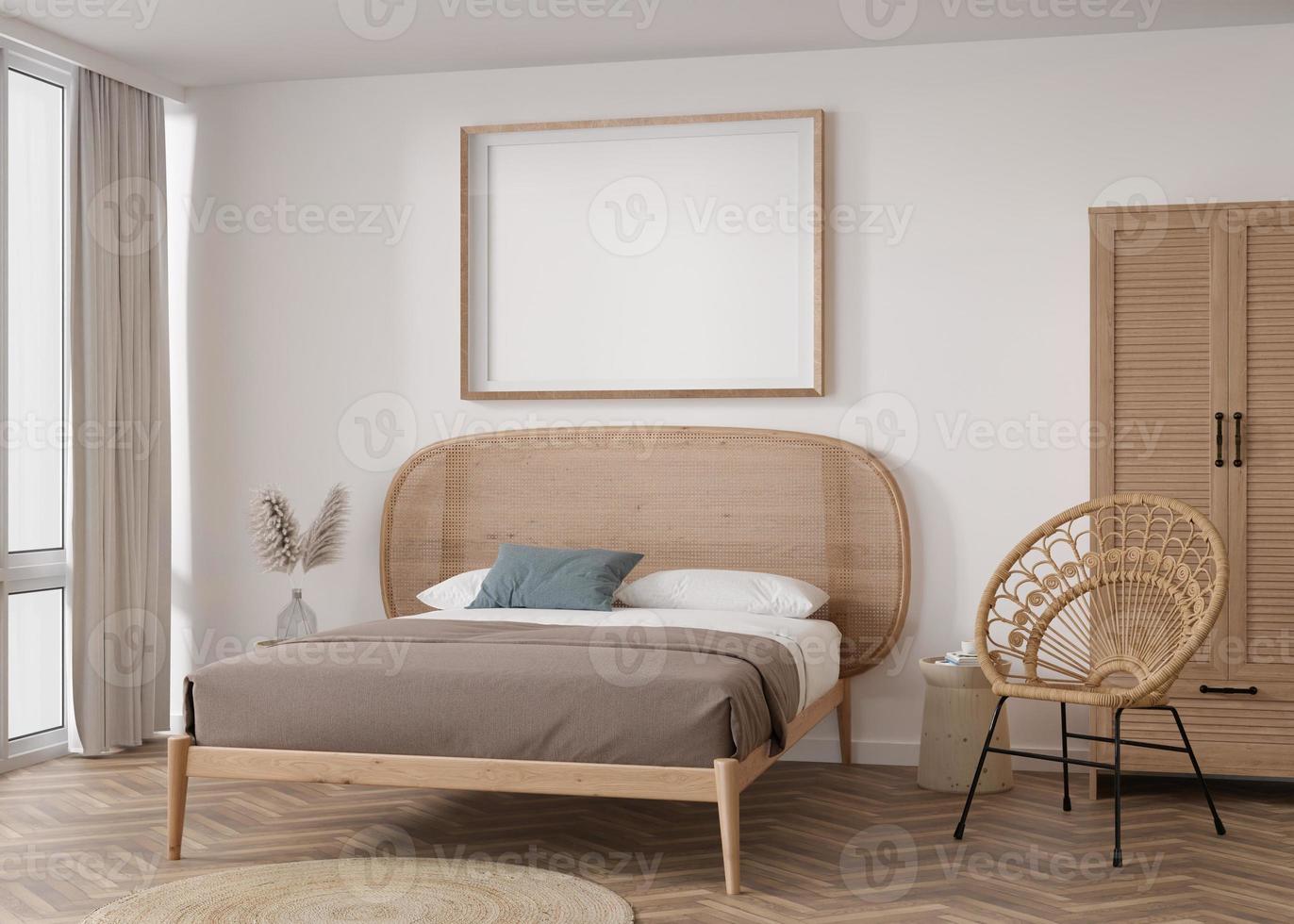 marco de imagen horizontal vacío en la pared blanca en el dormitorio moderno. maqueta interior en estilo boho. gratis, copia espacio para tu foto, poster. cama, sillón de mimbre, pampas grass. representación 3d foto