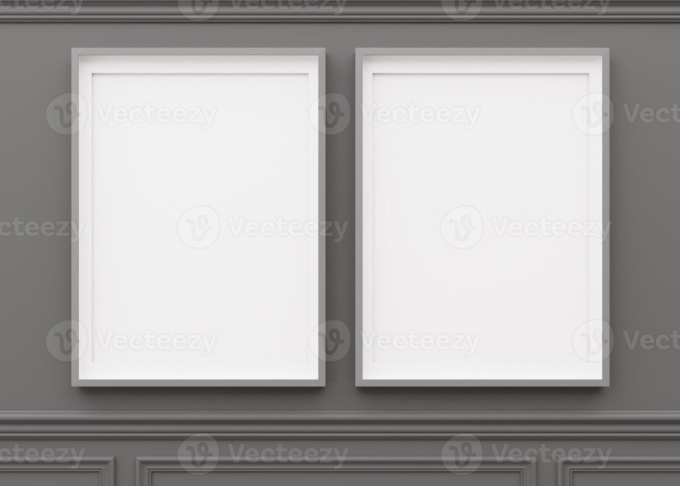 Two blank vertical picture frames hanging on gray wall. Template, mock up for artwork, picture or poster. Empty, copy space. Close up view. Simple, minimalist mockup. 3D rendering. photo