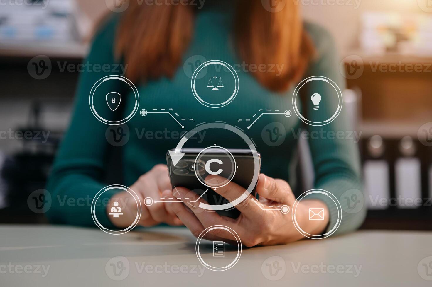 Copyright or patent concept, Person hand using laptop computer, tablet and smartphone with virtual screen copyright icon trademark, Creation ownership against piracy. photo