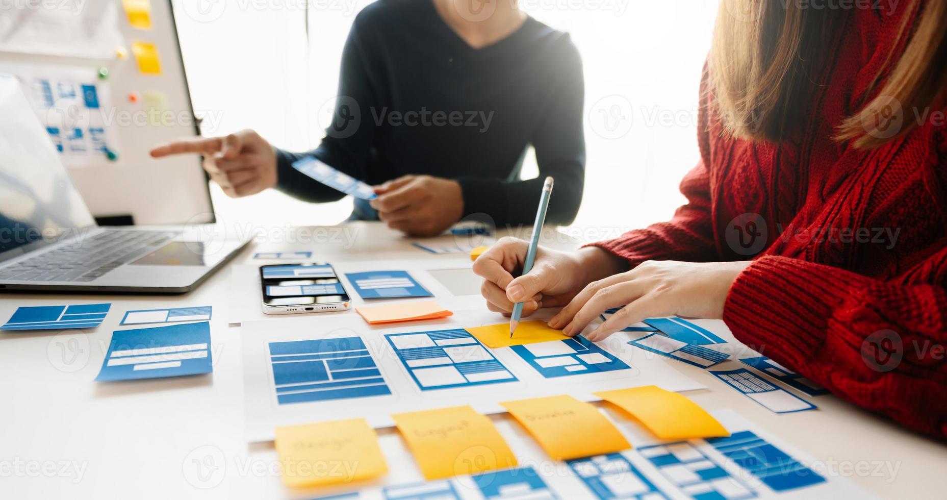 UX graphic designer planning application process development prototype wireframe for web smart phone. Creative digital development agency. photo