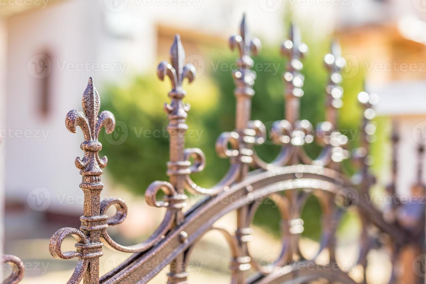 Metal fashion fence on blurred background photo
