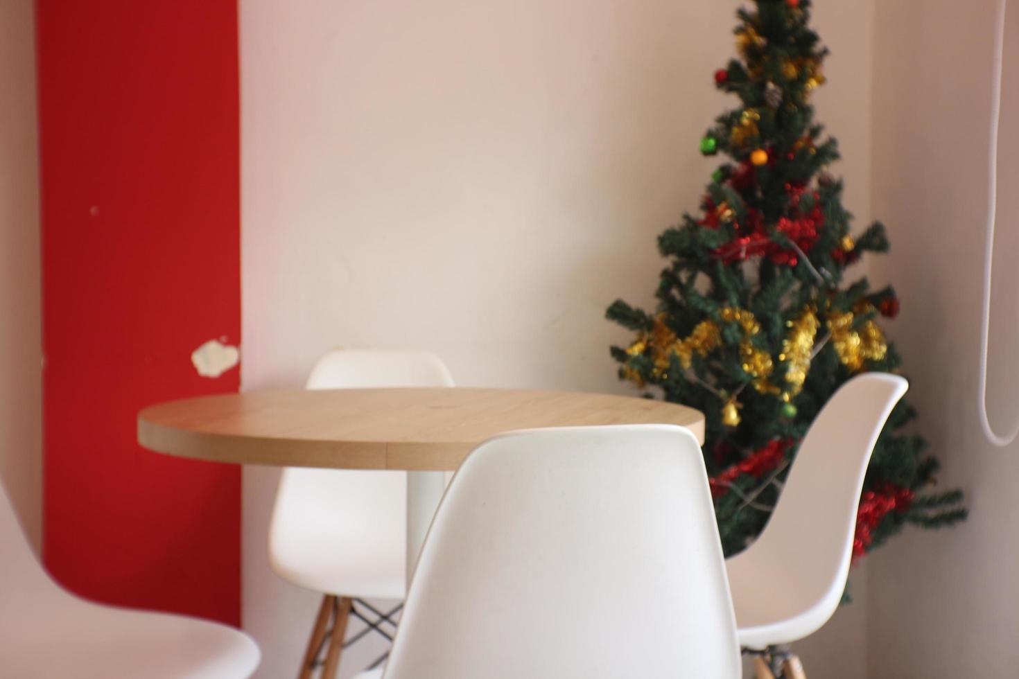 Empty chairs and tables at an ice cone shop. photo