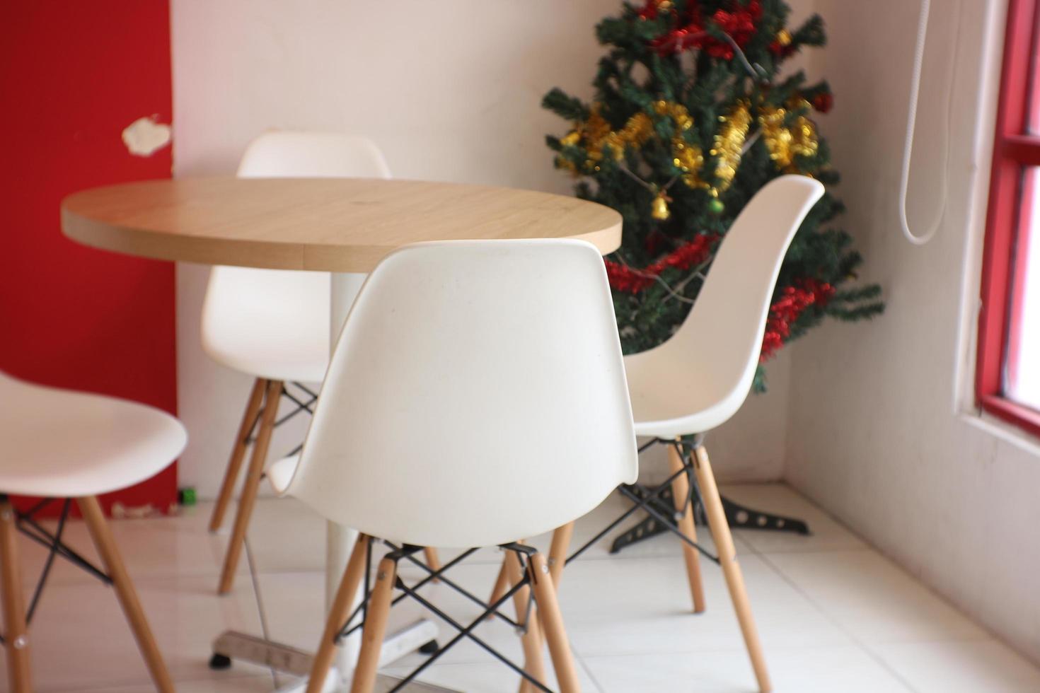 Empty chairs and tables at an ice cone shop photo