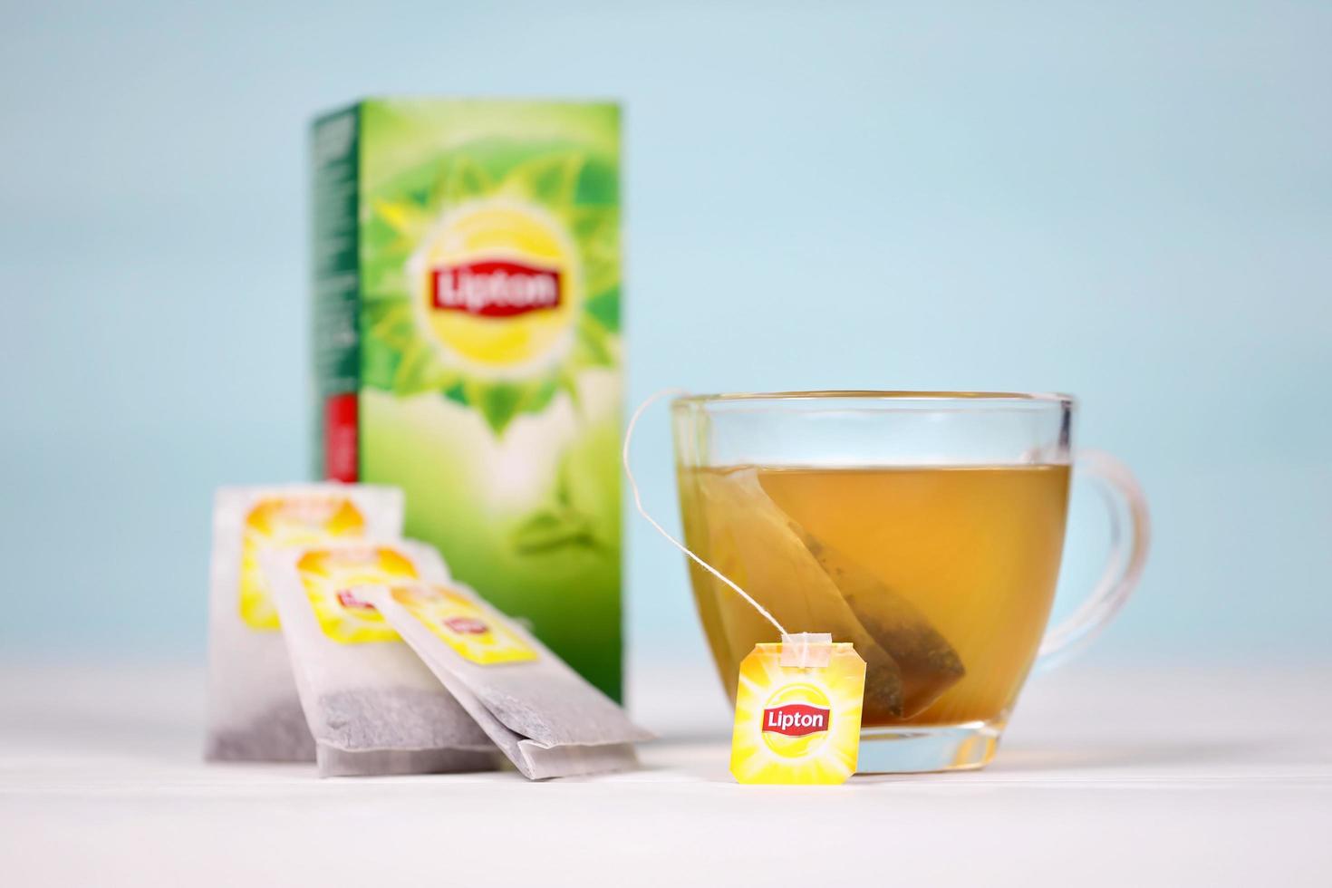 KHARKOV, UKRAINE - DECEMBER 8, 2020 Lipton classic green tea bags. Lipton is a British brand of tea owned by Unilever and PepsiCo photo