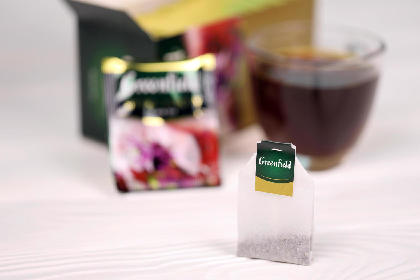 KHARKOV, UKRAINE - DECEMBER 8, 2020 Greenfield Spring Melody tea bags. Greenfield manufactured by Orimi Trade and Greenfield Tea ltd. photo