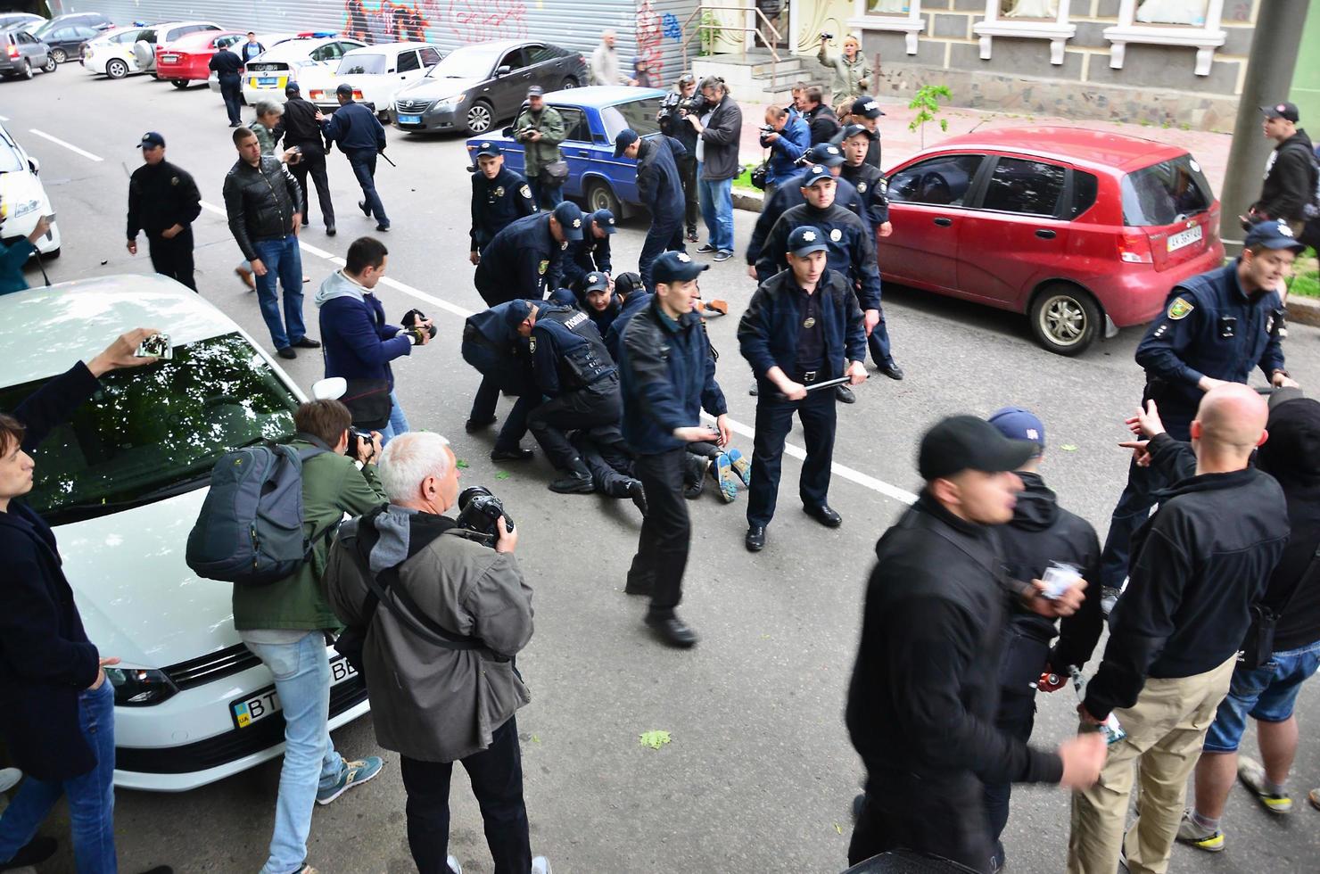 KHARKOV, UKRAINE - MAY 17, 2017 Police officers arrest Kharkiv right-wing activists who violated the law during the LGBT rally in Kharkov photo