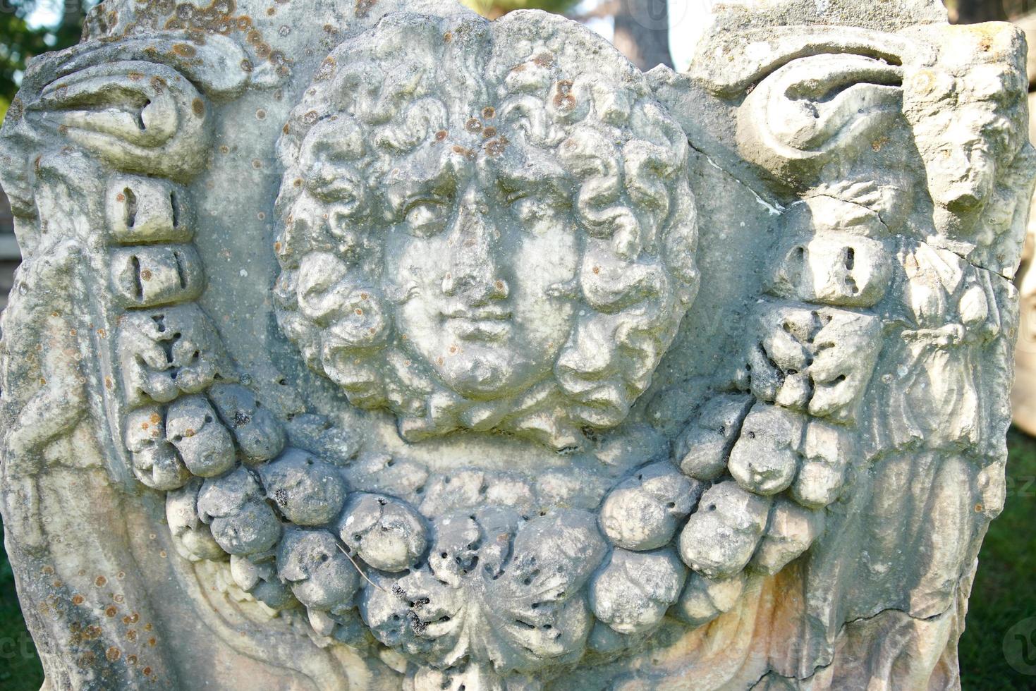 Relief on a Sarcophagus in Aphrodisias Ancient City in Aydin, Turkiye photo