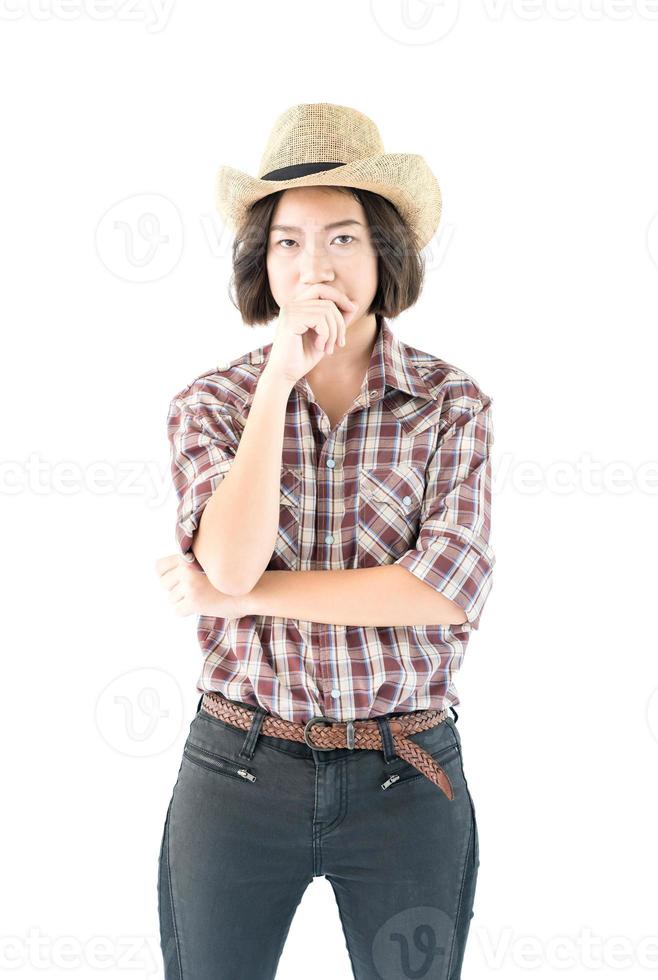 Young woman in a plaid shirt and arms crossed photo