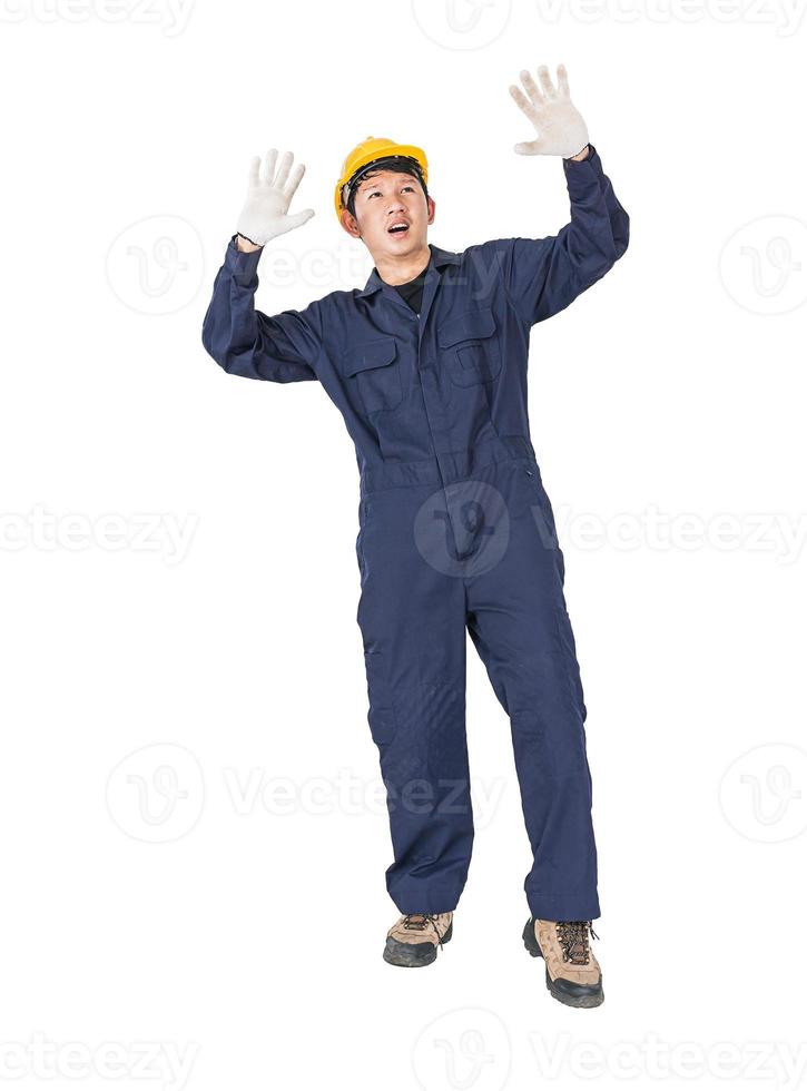 Workman with blue coveralls and hardhat in a uniform with clipping path photo