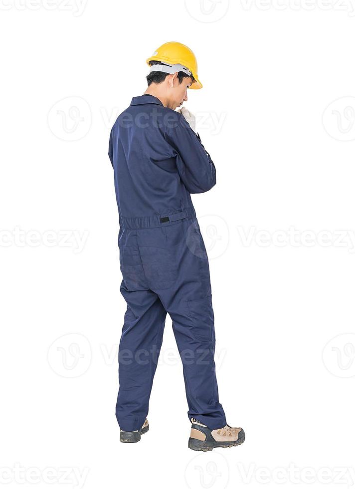 Workman with blue coveralls and hardhat in a uniform with clipping path photo