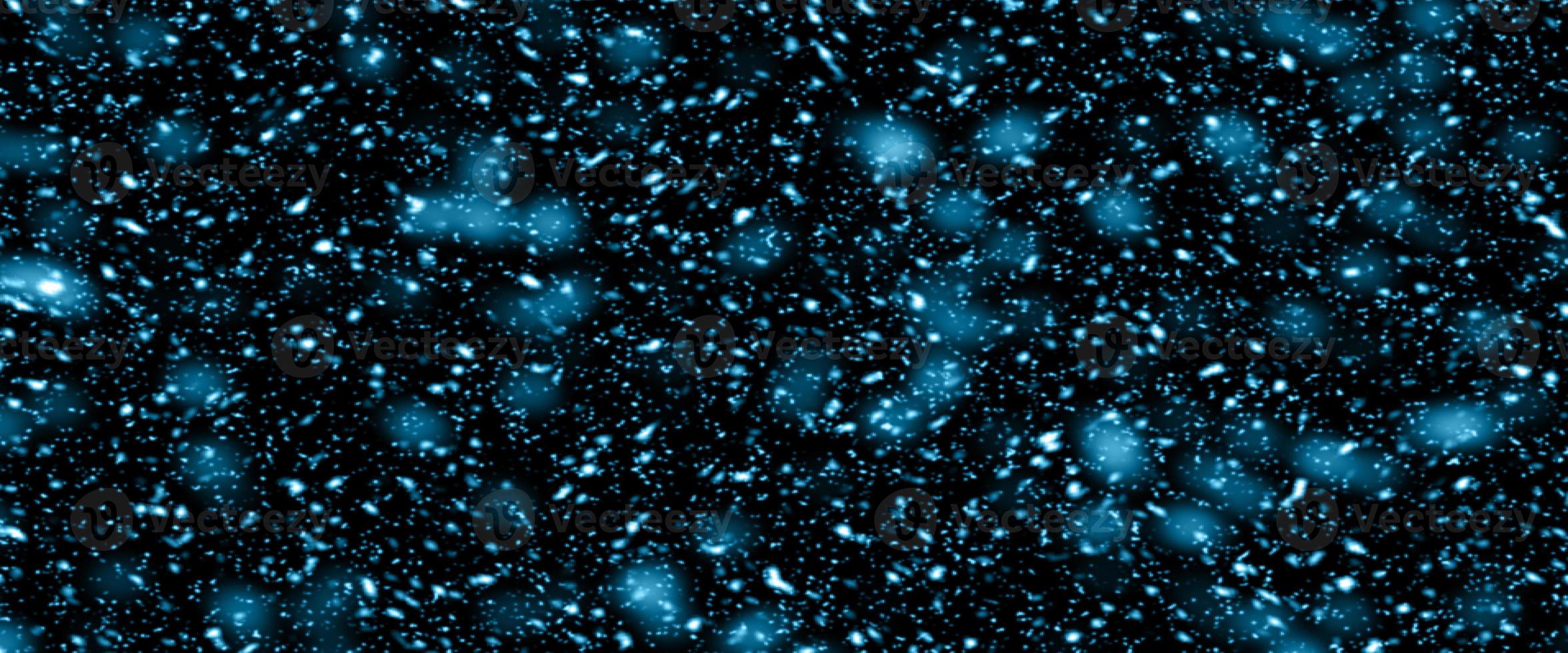 Colorful background blurry snow. Bokeh background with snowflake. Winter glittering snowflakes swirl bokeh background, backdrop with sparkling blue stars. Snowflake winter season. photo