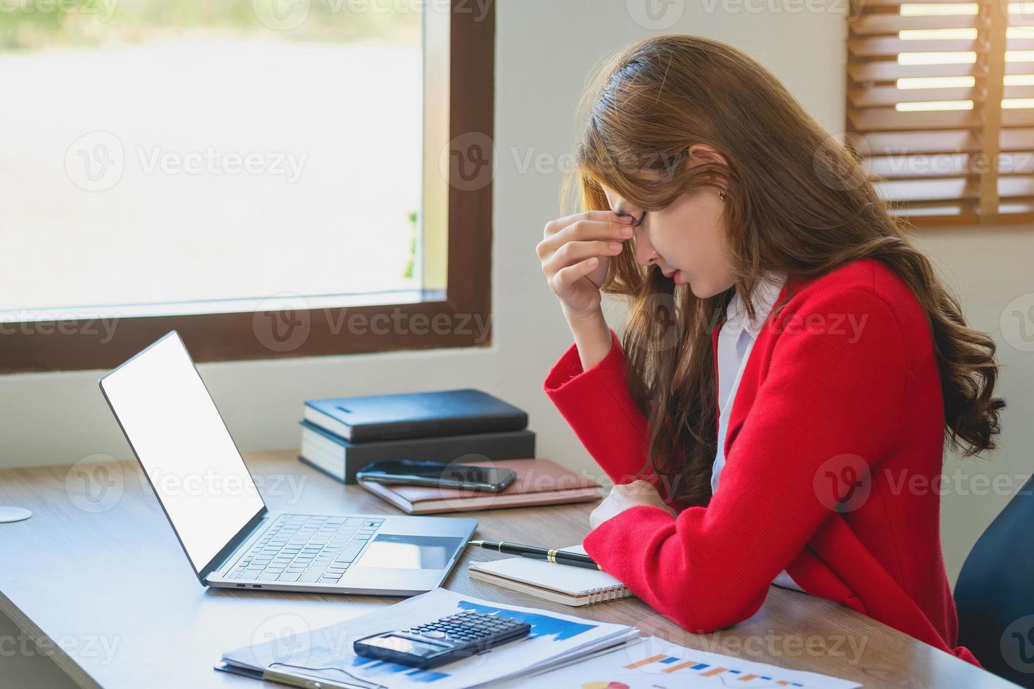 Concept Burnout Syndrome. Business Woman feels uncomfortable working. Which is caused by stress, accumulated from unsuccessful work And less resting body. Consult a specialist psychiatrist. photo