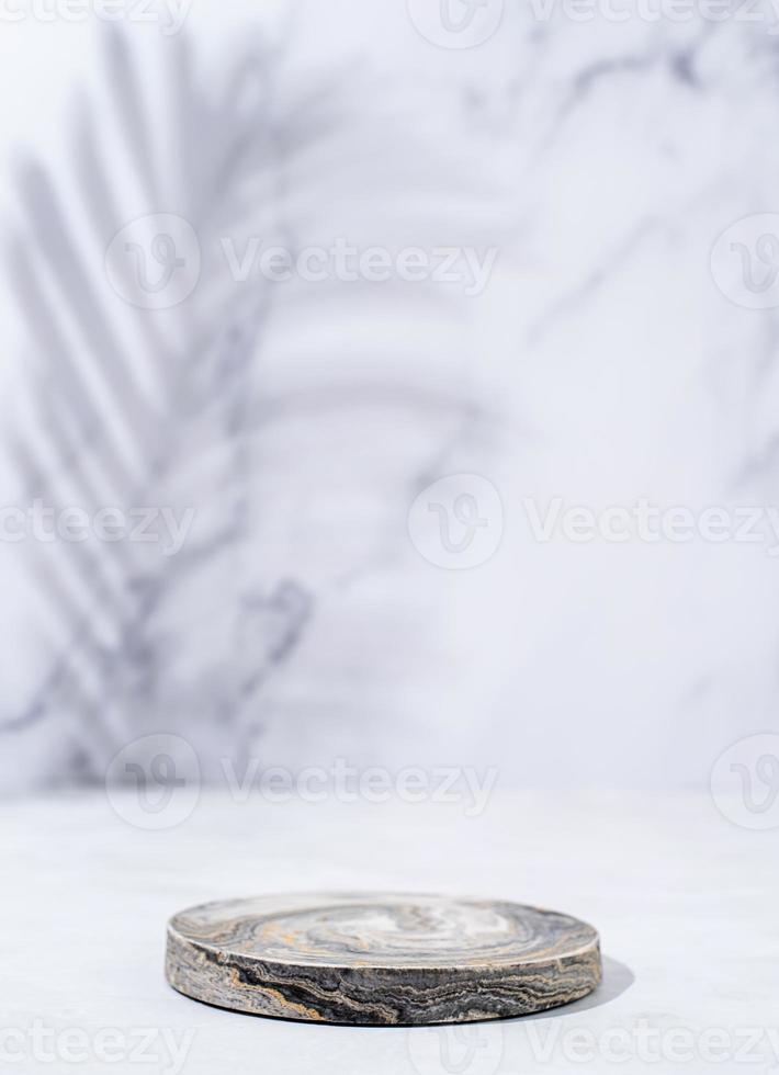 A minimalistic scene of a podium on white background, for natural cosmetics photo