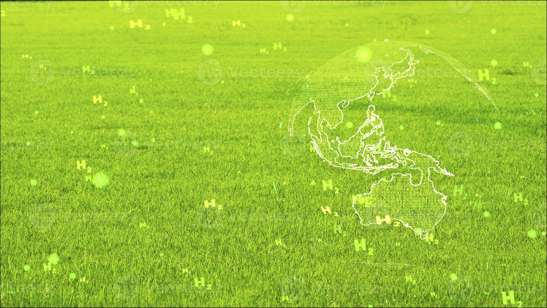 global digital and australia continent with green H2 text particles flying on green grass photo