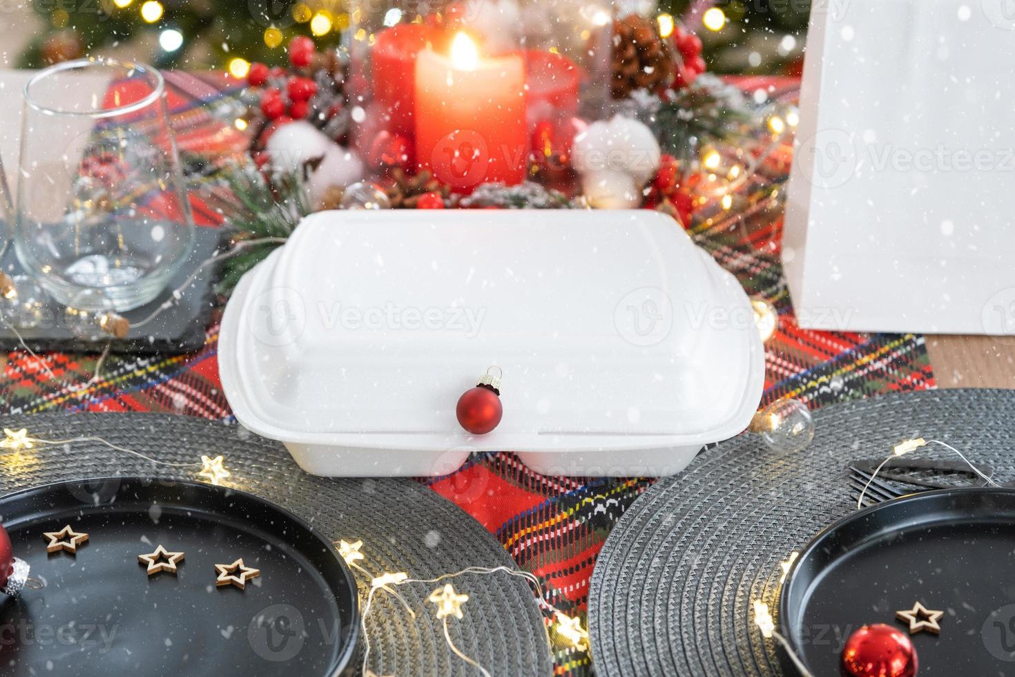 Food delivery service containers on table, festively served for the celebration of Christmas and new year. Tableware and loft-style decor. Saving time, hot order, disposable plastic box. mock up photo