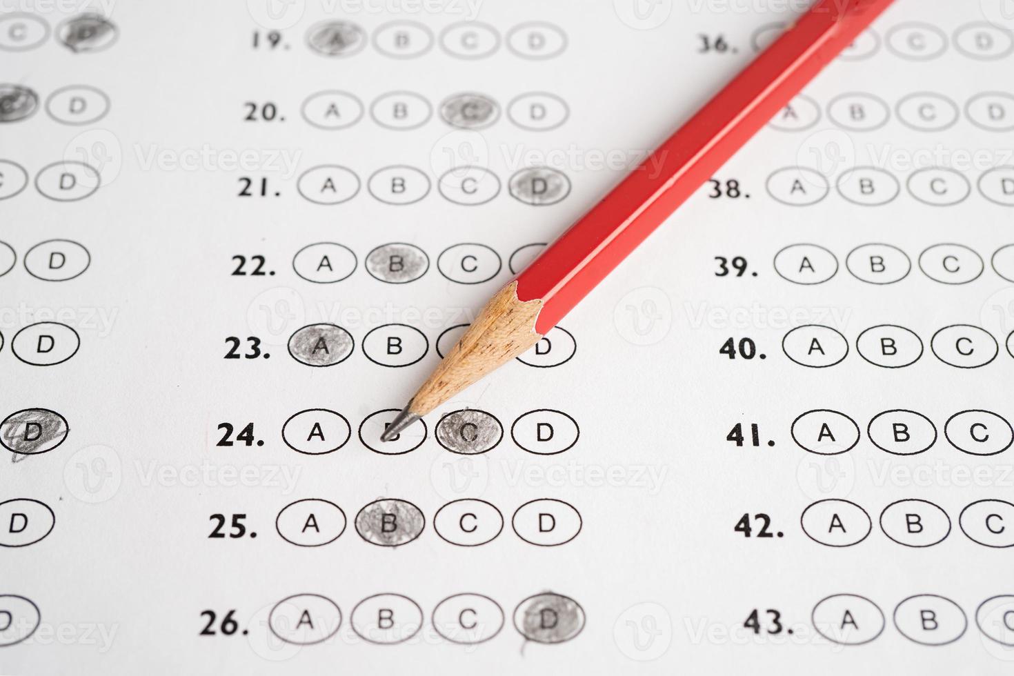 Answer sheets with pencil drawing fill to select choice, education concept. photo