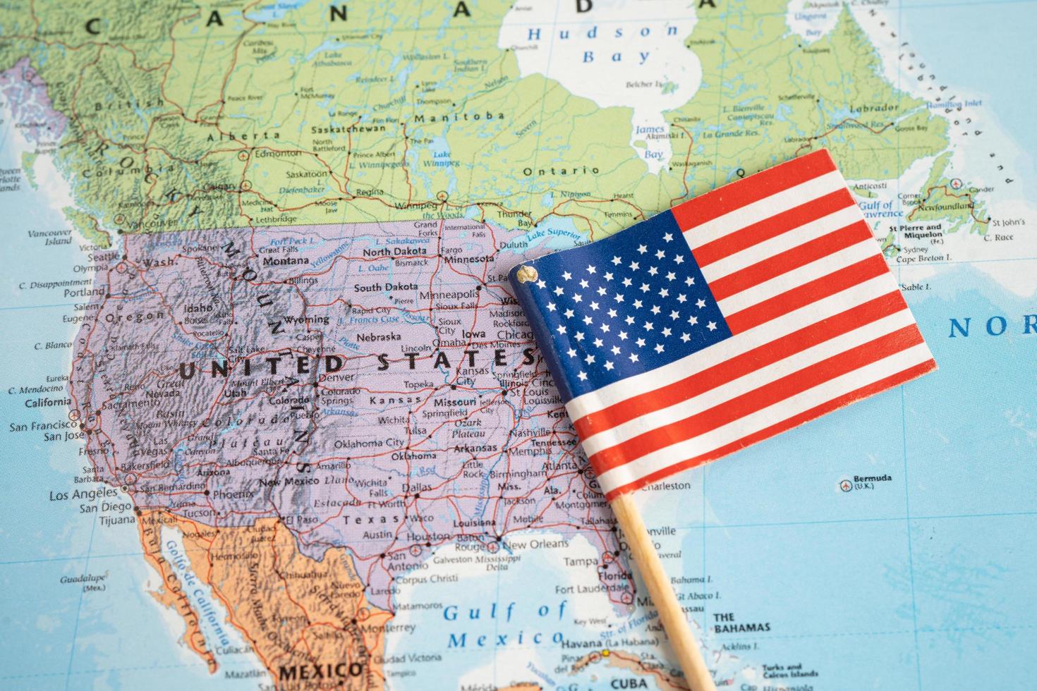 Bangkok, Thailand - February 1, 2022 USA America flag on world map background. photo