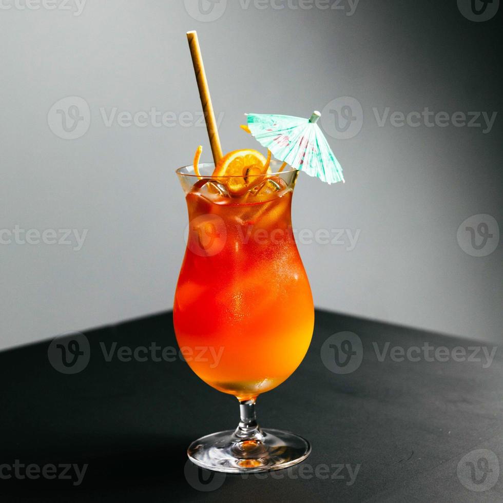 Orange Juice Cocktail with Umbrella photo