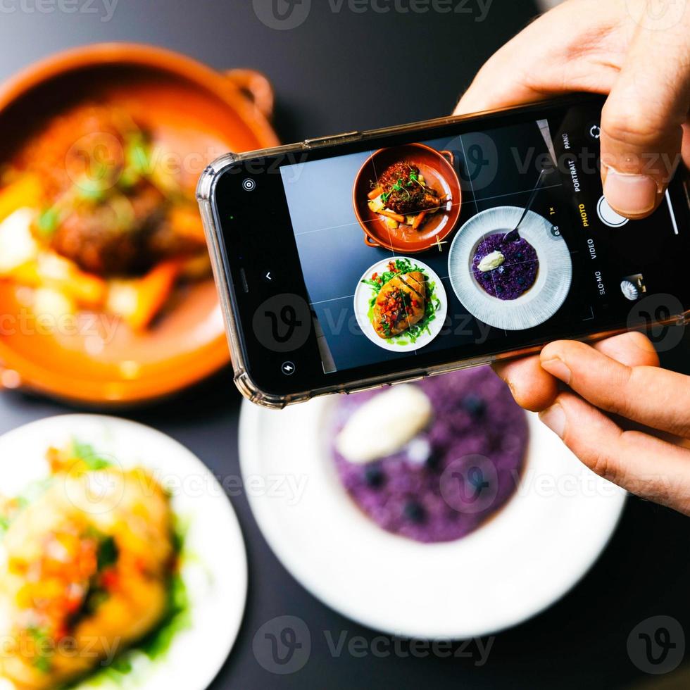 taking photo for the food in the plates