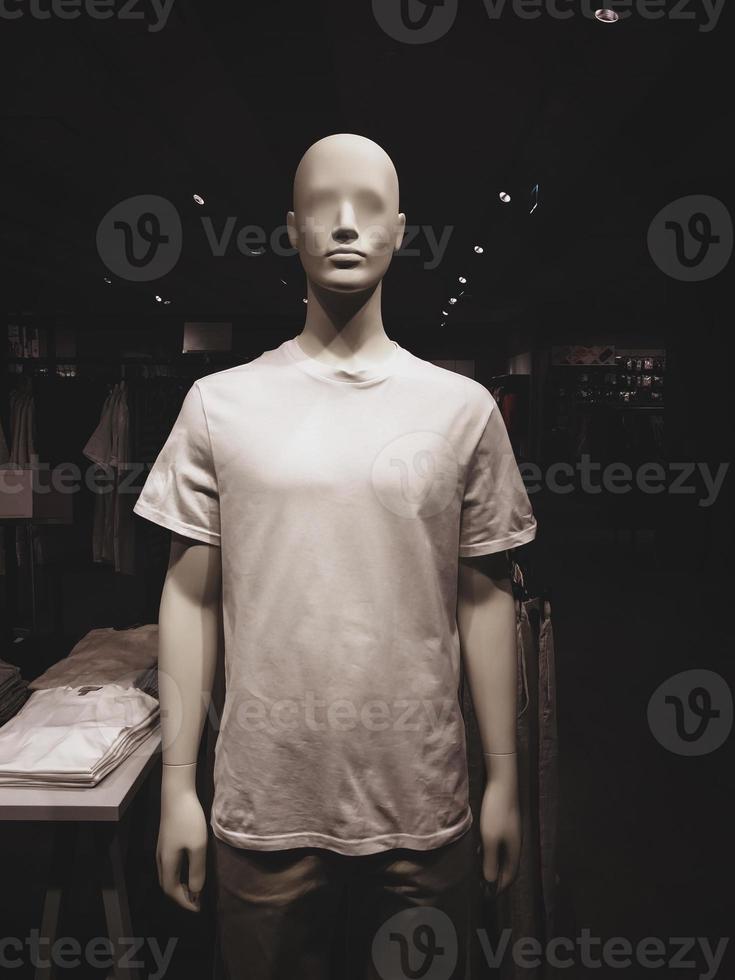 Men's casual clothing store, male dummy in t-shirt, closeup photo