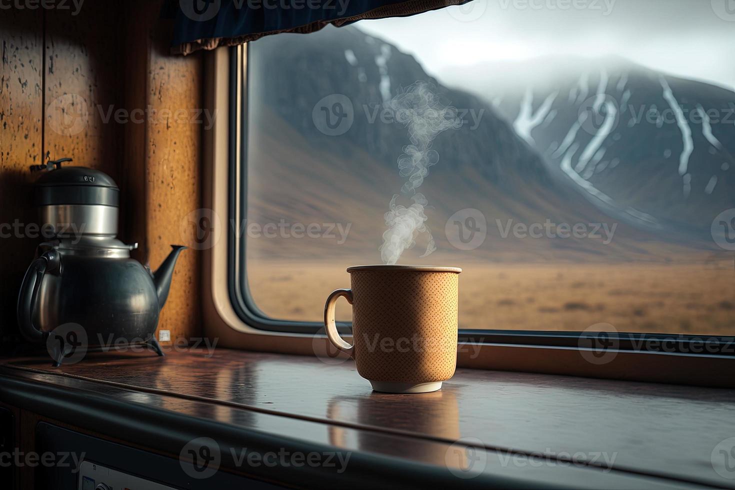 Steaming cup of coffee on the window sill of a campervan - Van Life and Slow living photo